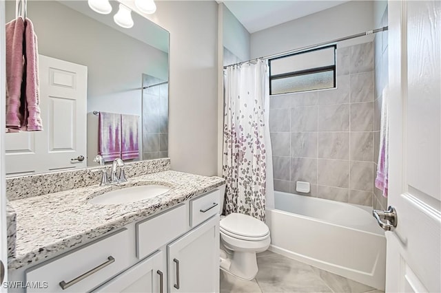 bathroom with shower / bath combo, vanity, and toilet