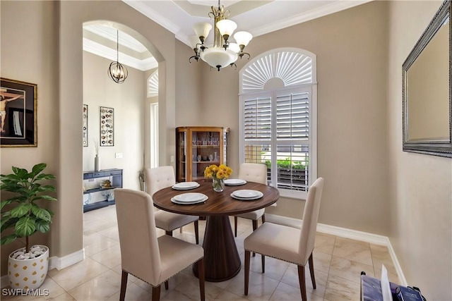 tiled dining room featuring crown molding and a chandelier