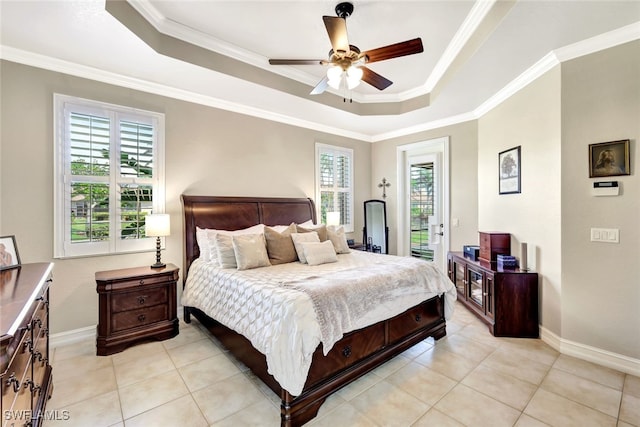 tiled bedroom with a raised ceiling, ornamental molding, access to exterior, and ceiling fan