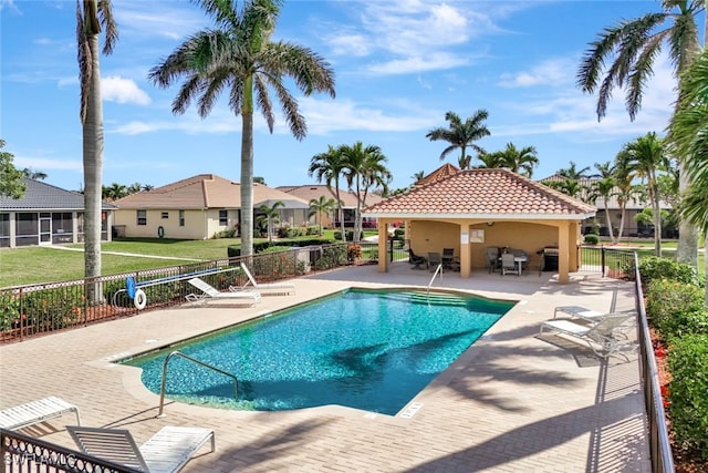 view of swimming pool featuring a patio area