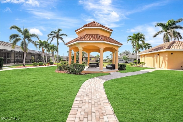 view of community featuring a gazebo and a yard