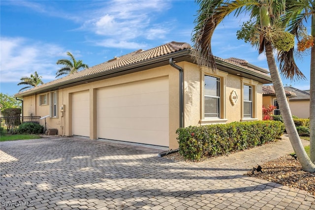 view of home's exterior with a garage