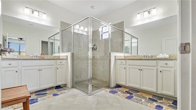 bathroom featuring vanity and walk in shower