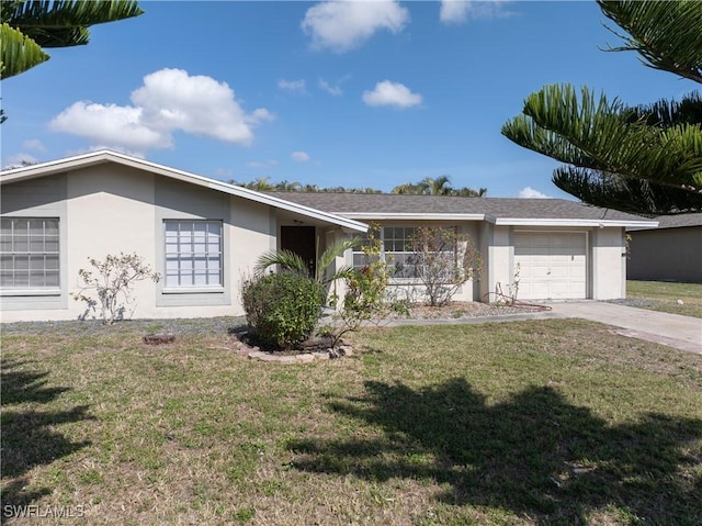 single story home with a garage and a front yard