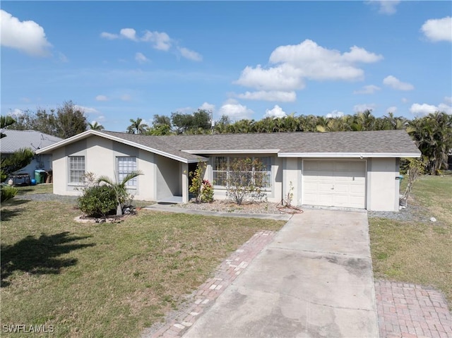 ranch-style home featuring a garage and a front yard