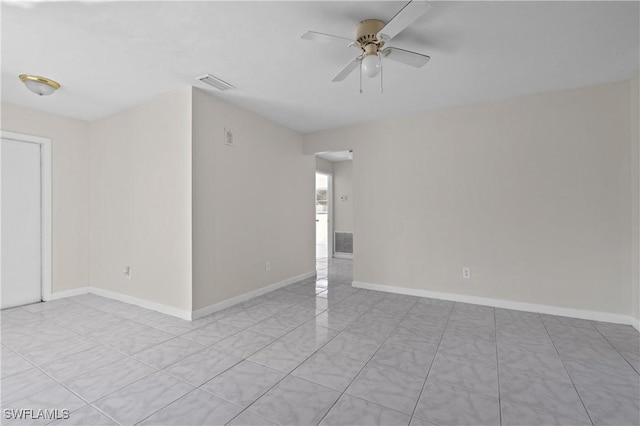 spare room featuring ceiling fan