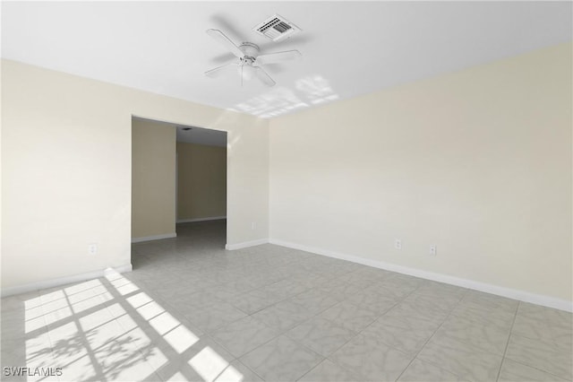 unfurnished room featuring ceiling fan