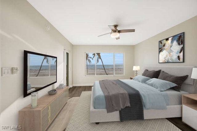 7930 Estero Blvd, Fort Myers Beach, FL 33931 - bedroom featuring wood finished floors and a ceiling fan