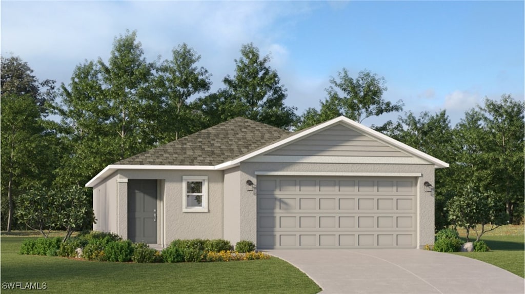 view of front of property featuring a garage and a front lawn