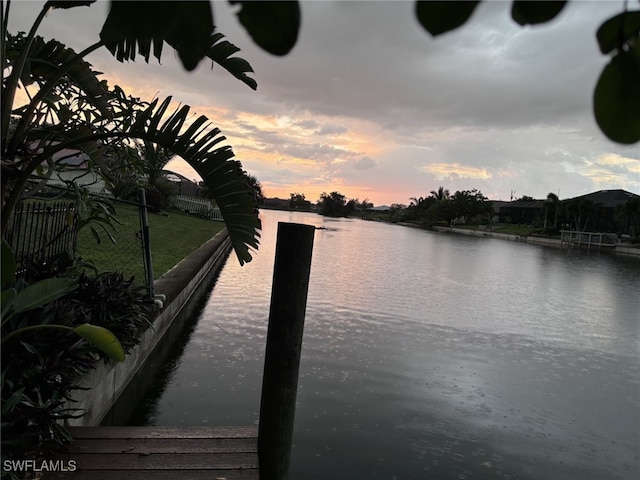 property view of water with fence