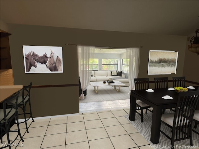 dining space with light tile patterned floors