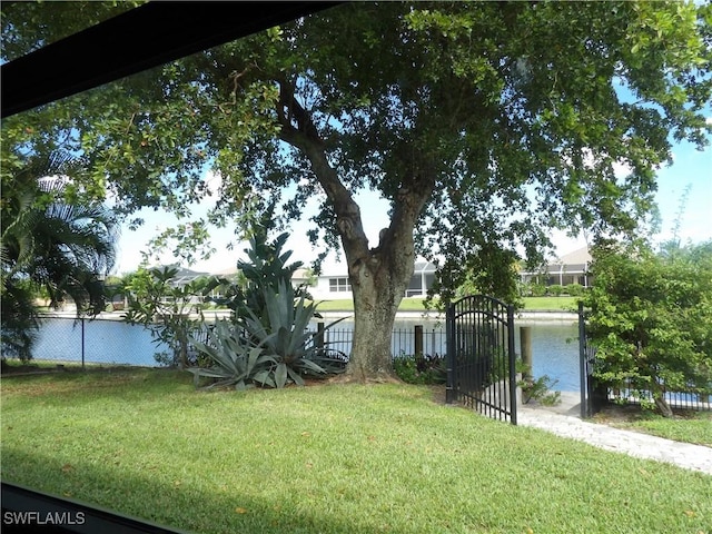 exterior space with fence and a gate