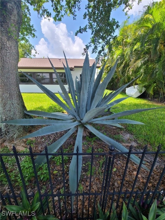 view of gate featuring fence