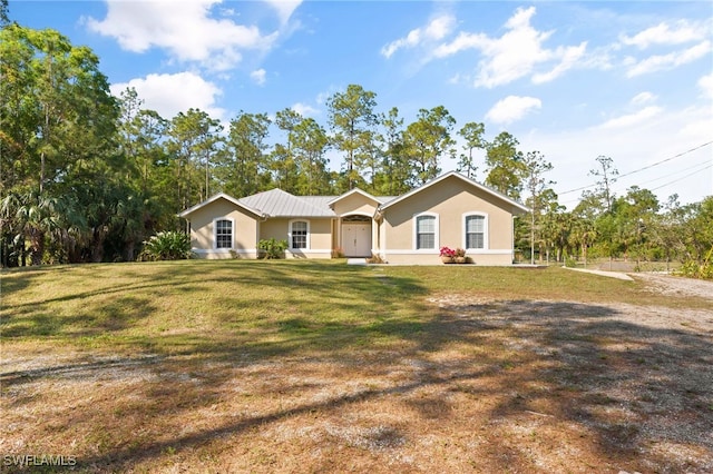 ranch-style house with a front lawn