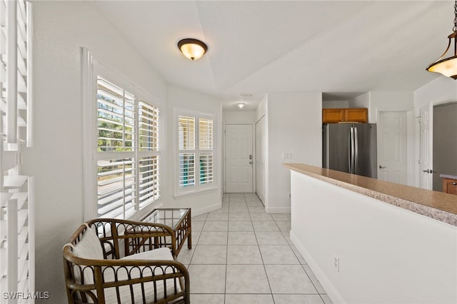 interior space with light tile patterned floors