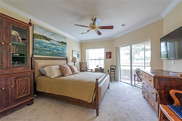 carpeted bedroom with ornamental molding, access to exterior, and ceiling fan