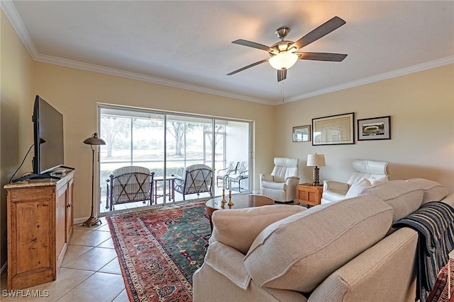 living room featuring crown molding, ceiling fan, and light tile patterned floors