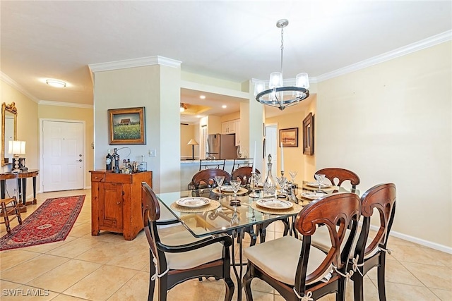 tiled dining area with an inviting chandelier and crown molding