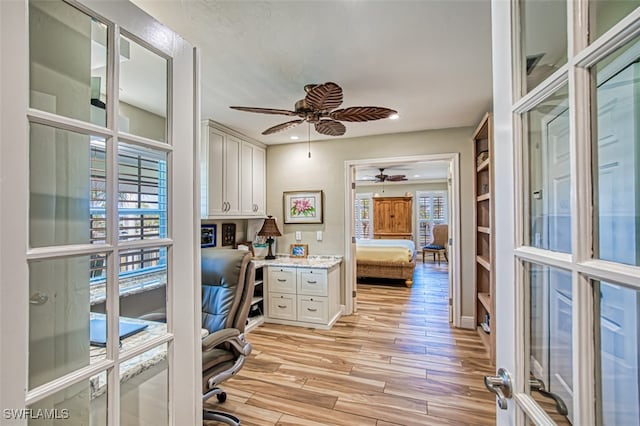 office area featuring ceiling fan and light hardwood / wood-style flooring