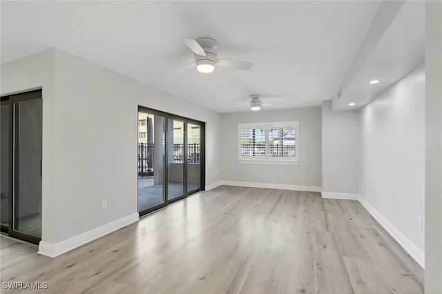 spare room featuring light hardwood / wood-style floors