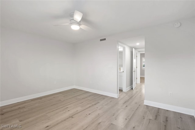 unfurnished room with light hardwood / wood-style floors and ceiling fan