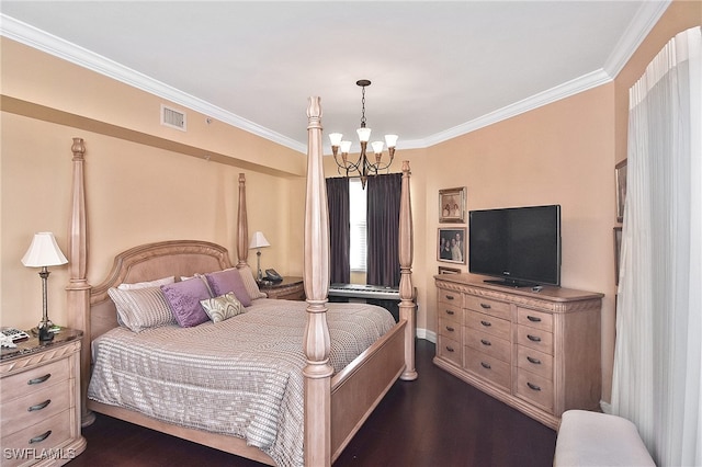 bedroom with crown molding, dark hardwood / wood-style floors, and a notable chandelier