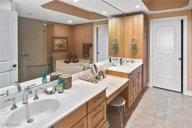 bathroom featuring tile patterned floors, separate shower and tub, and vanity