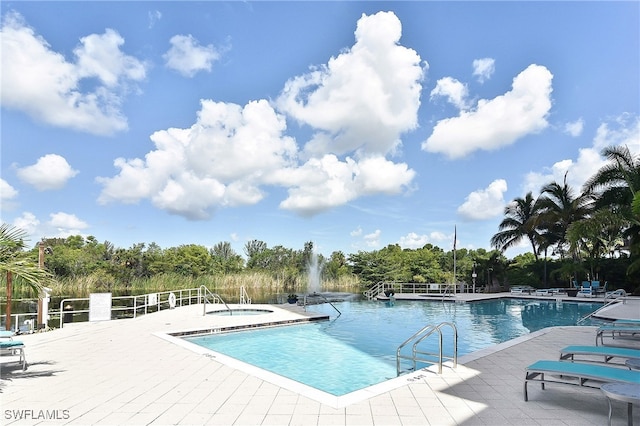 view of pool featuring a patio