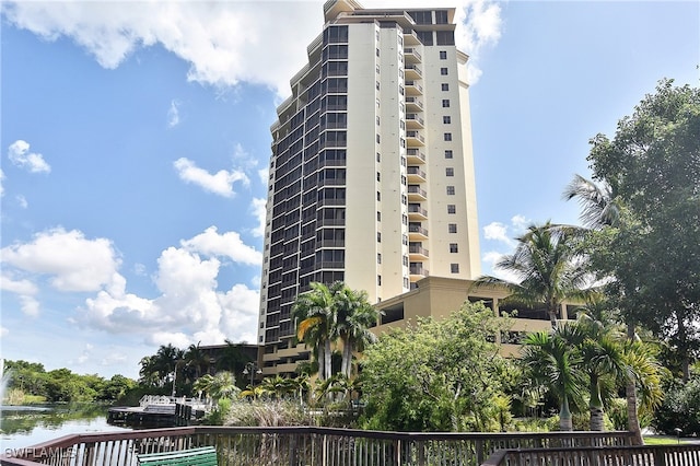 view of building exterior featuring a water view