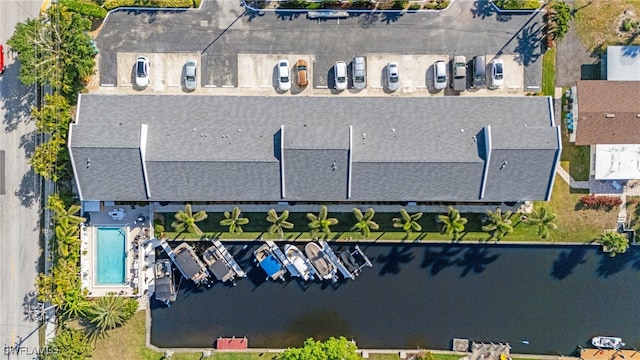 drone / aerial view with a water view