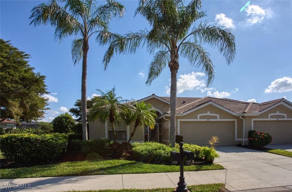 view of front of property featuring a garage