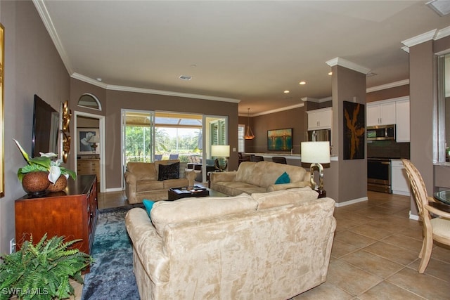 living room featuring light tile patterned flooring and ornamental molding