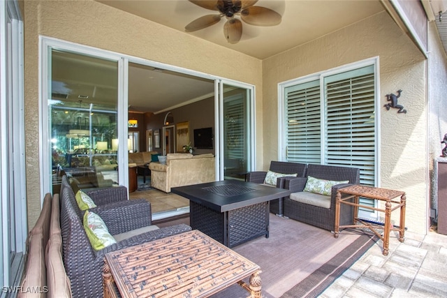 view of patio / terrace featuring outdoor lounge area and ceiling fan