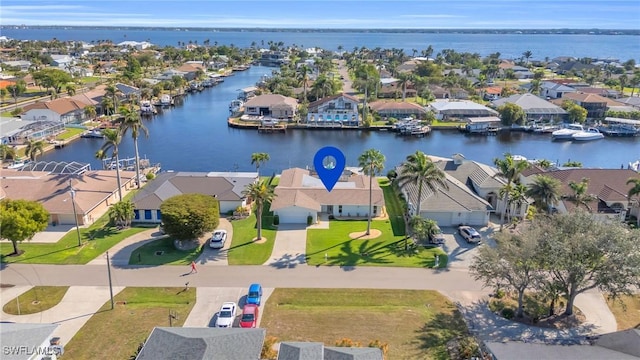 bird's eye view with a water view