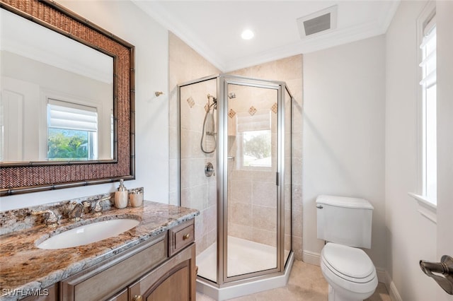 bathroom with a shower with door, ornamental molding, vanity, and toilet