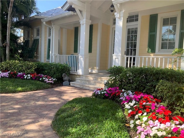 property entrance with a porch