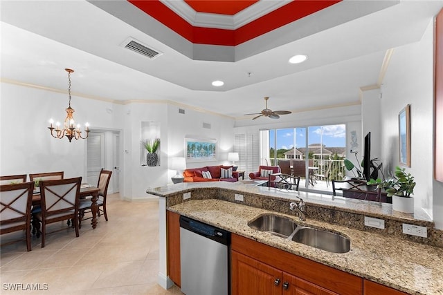 kitchen with sink, decorative light fixtures, stainless steel dishwasher, ornamental molding, and light stone countertops