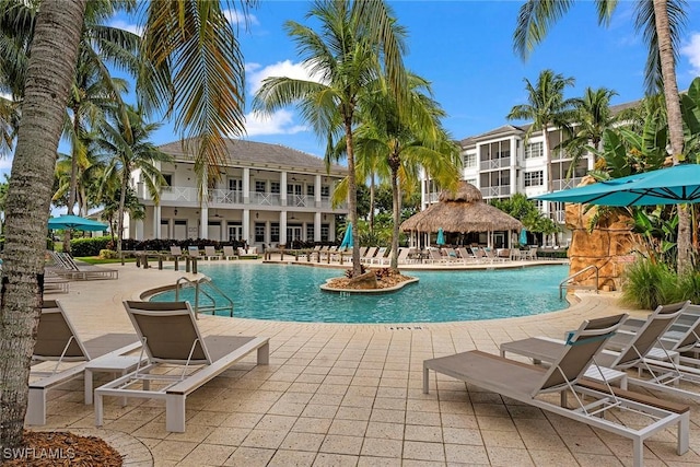 view of swimming pool with a gazebo and a patio area