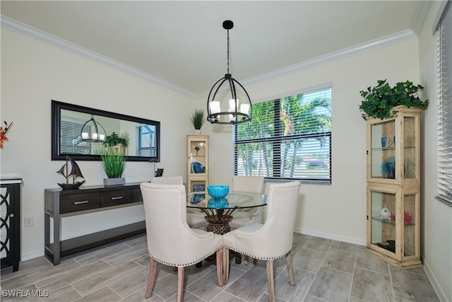 dining room featuring crown molding and a notable chandelier