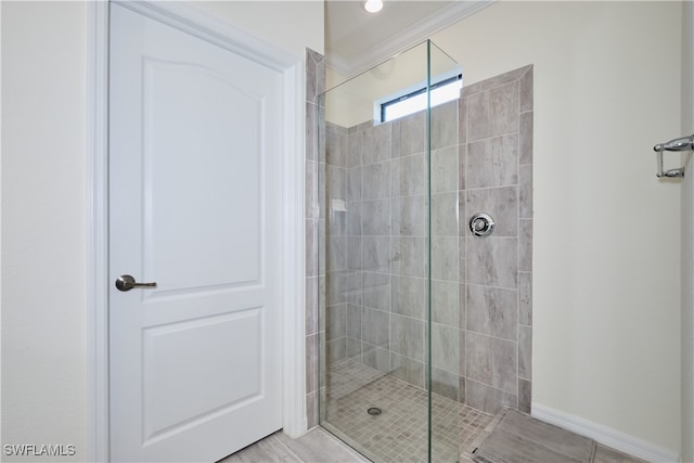 bathroom featuring tiled shower