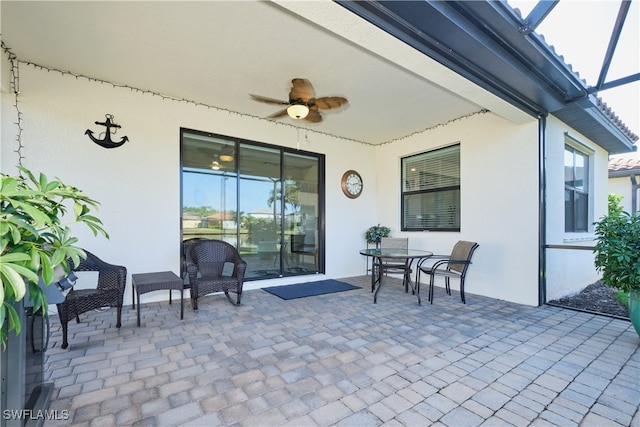 view of patio / terrace featuring ceiling fan