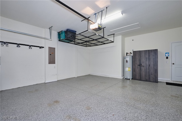 garage featuring a garage door opener, electric panel, and electric water heater