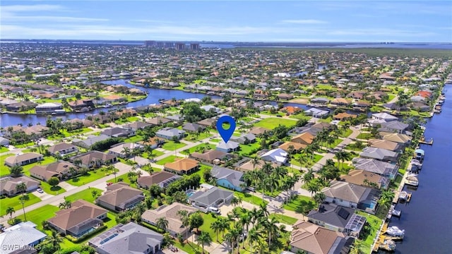 bird's eye view with a water view