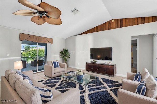 tiled living room with ceiling fan and vaulted ceiling