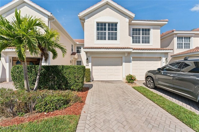 view of front of property with a garage