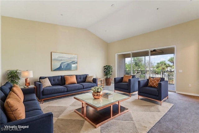 carpeted living room featuring vaulted ceiling