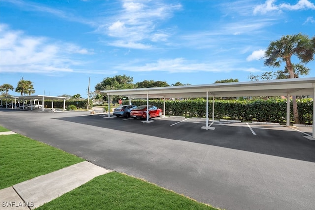 view of parking with a carport