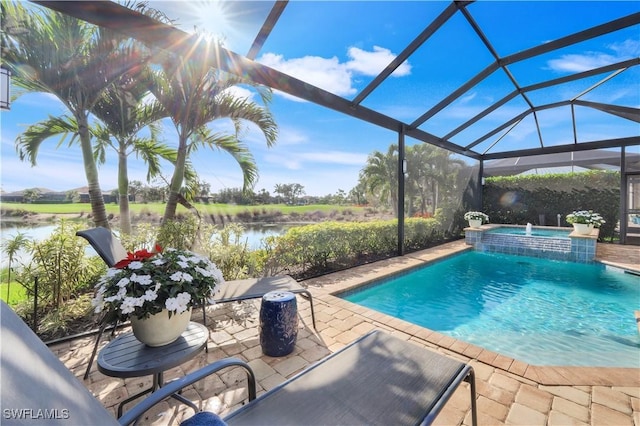 view of swimming pool featuring a water view, an in ground hot tub, a lanai, and a patio area