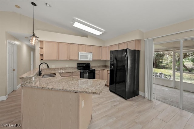 kitchen featuring sink, black appliances, kitchen peninsula, and light brown cabinets