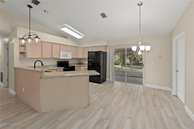 kitchen with vaulted ceiling, light brown cabinetry, black appliances, hanging light fixtures, and kitchen peninsula